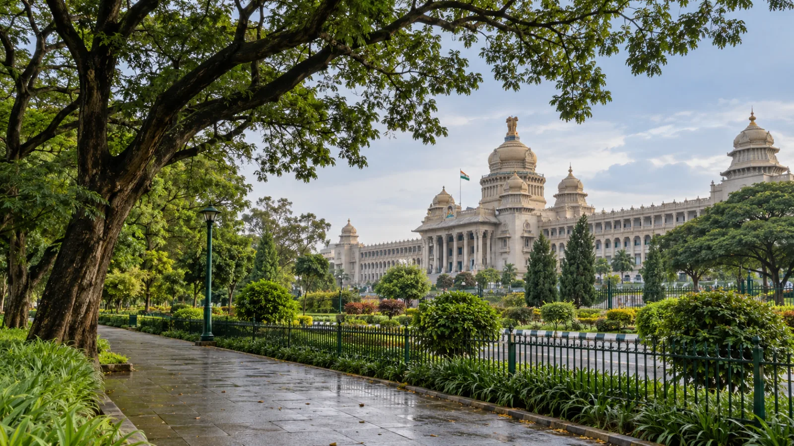 Photorealistic view of Bengaluru civic architecture from the green edge of Cubbon Park